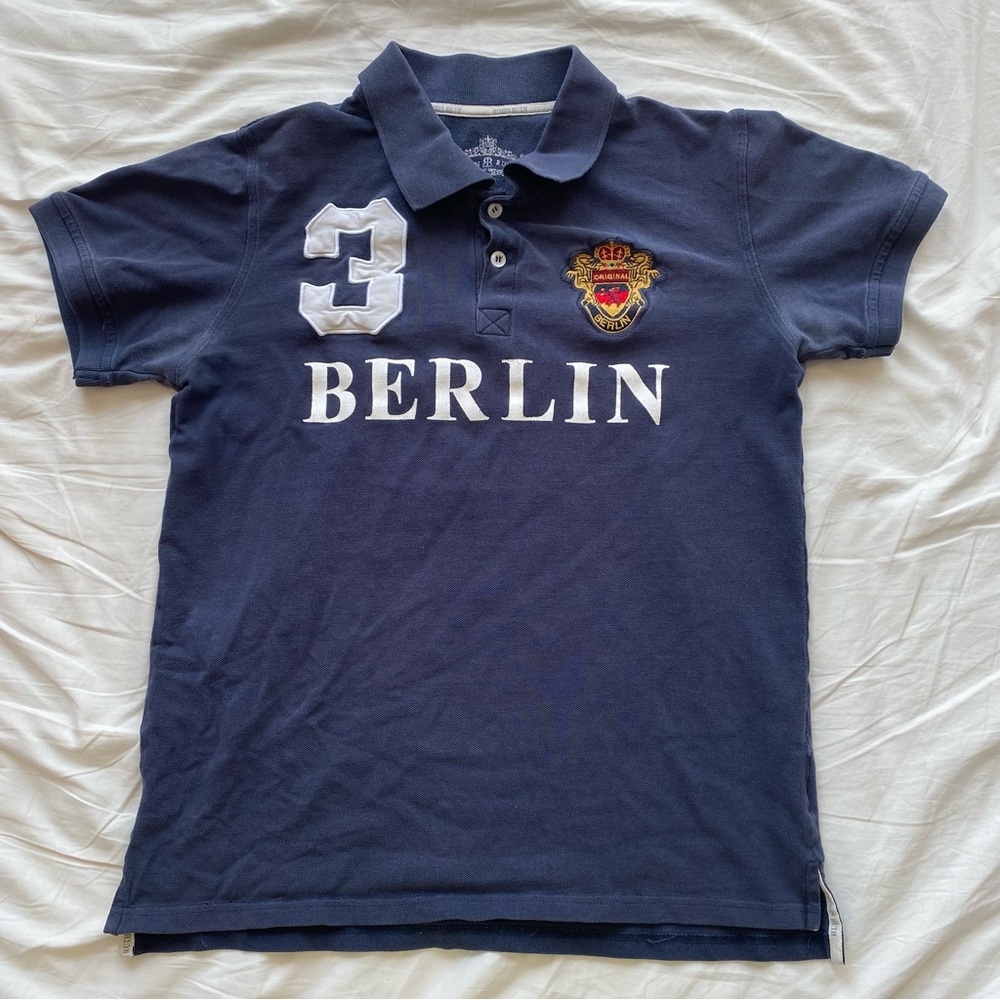 Robin Ruth Navy Polo with 'Berlin' Embroidery & Crest